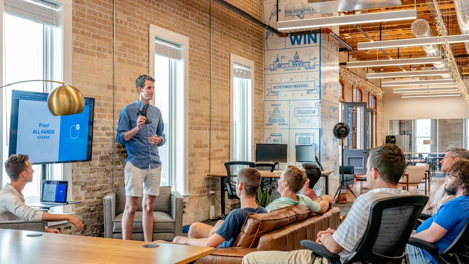 Designers and developers discussing a product